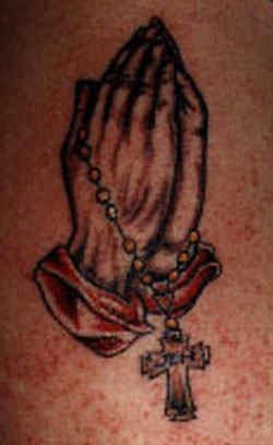 Praying hands coloured tattoo