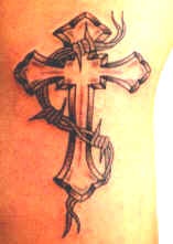 Cross and barb wire tattoo
