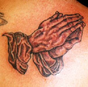 Old man praying hands tattoo