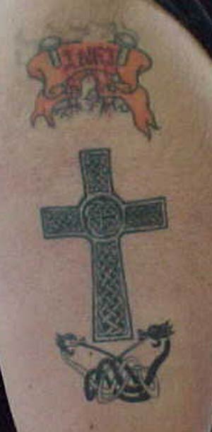 Celtic cross with tracery tattoo