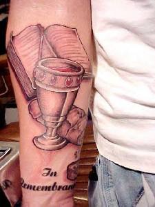 Holy Grail and book tattoo