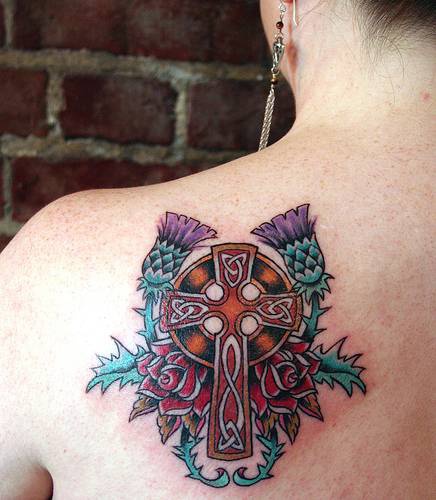 Celtic cross with rose and thistle tattoo