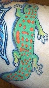 Green dotted amphibia tattoo