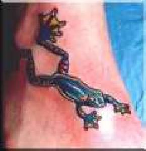 Realistic colourful frog tattoo