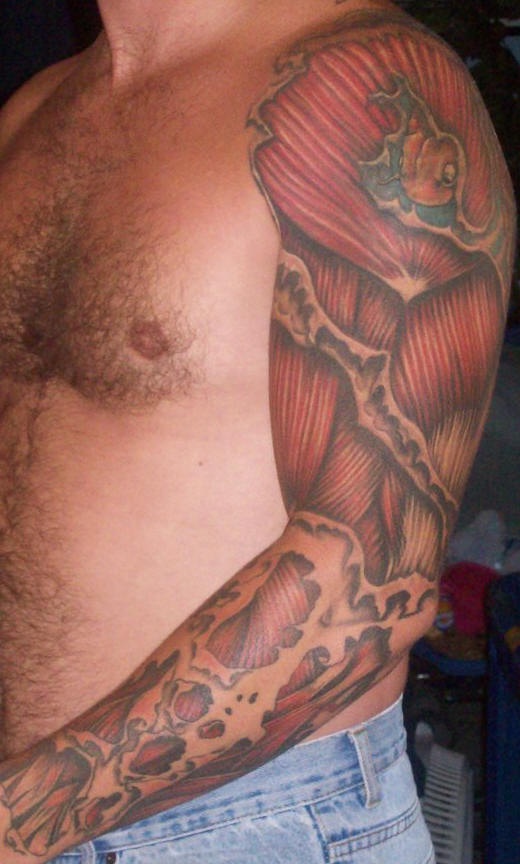 Realistic muscle flesh  tattoo on arm