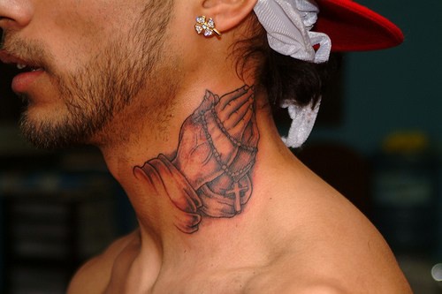Praying hands woth rosary tattoo on neck