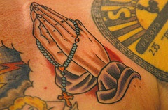 Rosary and hands classic tattoo