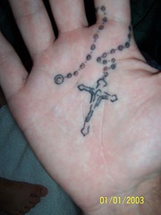 Rosary on inner hand tattoo