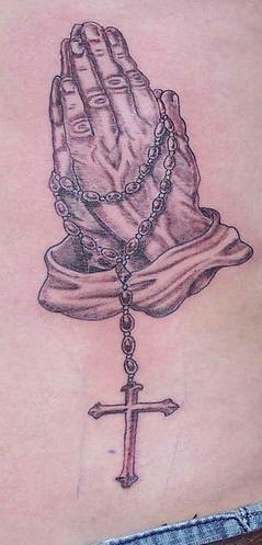 Rosary and old praying hands tattoo
