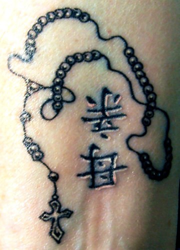 Rosary beads with hieroglyphs tattoo