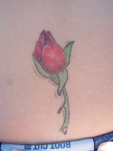 Elegant red rose tattoo