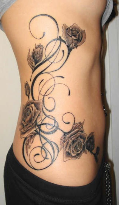 Tattooed on ribs,  chic, black, designed  roses