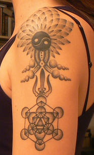 Occult geometry shoulder tattoo