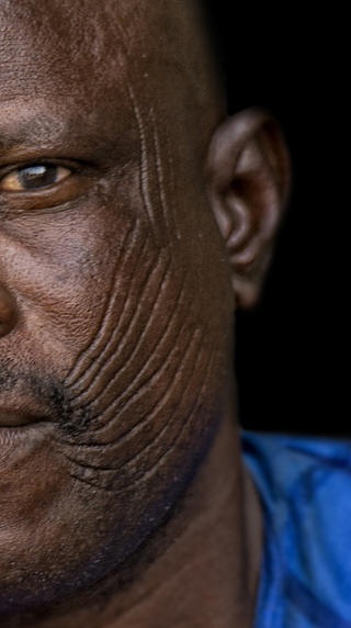 Traditional scarification on face