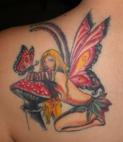 Sexy fairy on mushroom with butterflies  tattoo