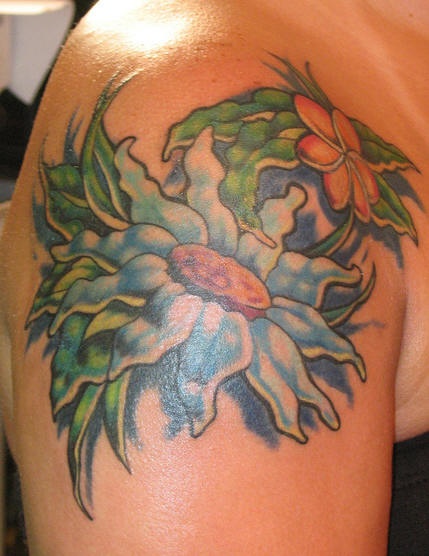 Shoulder tattoo, beautiful blue wide flower,juicy leaves