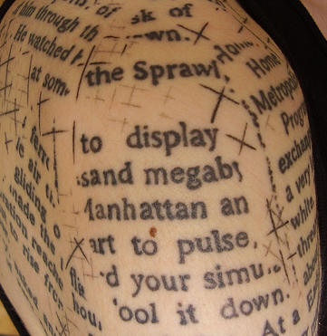 Shoulder tattoo, many text,different fragments