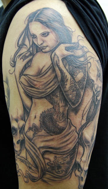 Shoulder tattoo, good-loocking girl, naked with monster