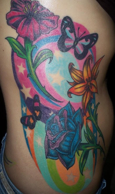 Side tattoo, picturesque, parti-coloured flowers and butterflies