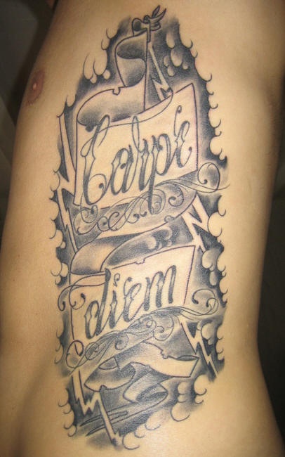Side tattoo, carpe diem, styled  inscription, stormy sky
