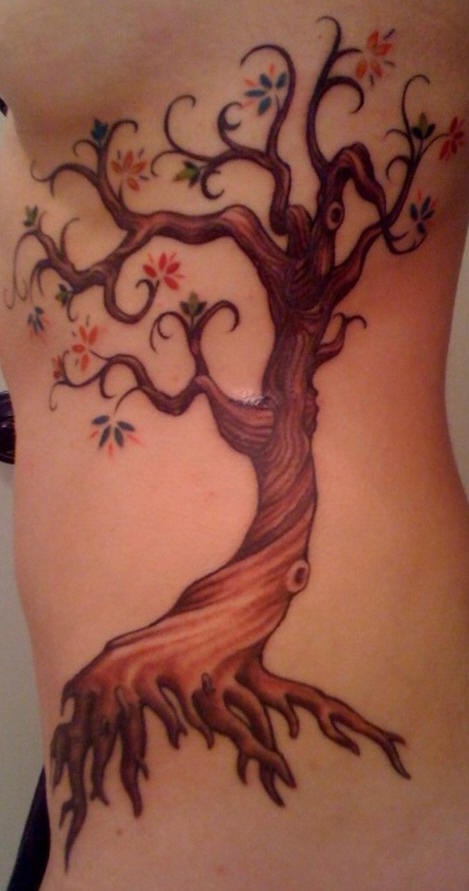 Side tattoo, beautiful tree with little flowers