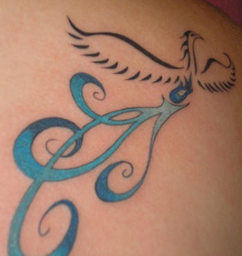 Elegant magic bluebird tattoo