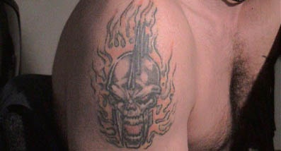 Flaming skull warrior  tattoo