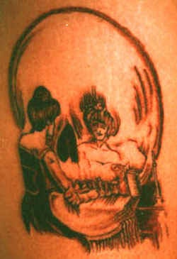 Two ladies as skull image tattoo