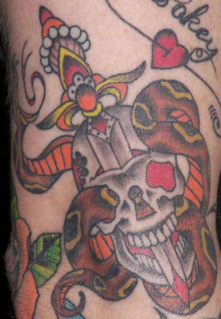 Colourful skull dagger and snake tattoo