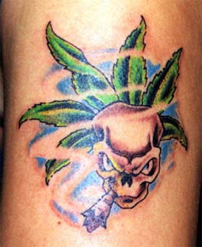 Smoking skull with marijuana tattoo
