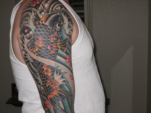 Black koi full sleeve tattoo