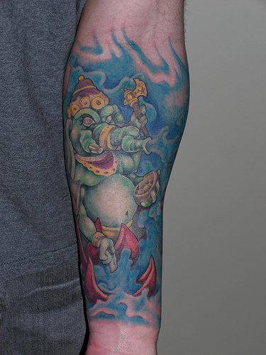 Angry ganesha coloured sleeve tattoo