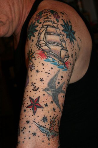 Coloured nautical sleeve tattoo