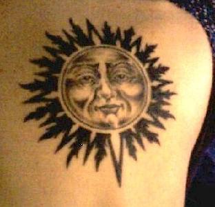 Black ink humanized sun tattoo