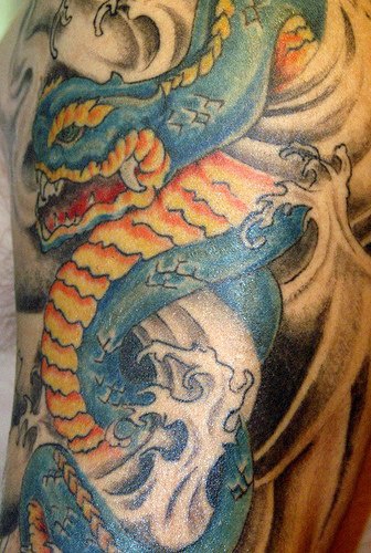 Asian blue snake tattoo