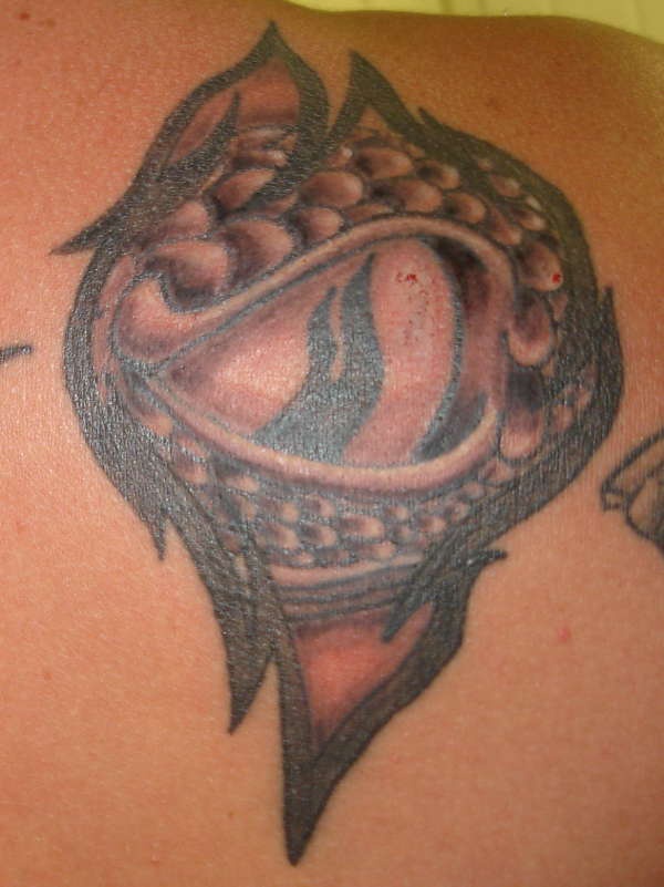 Snake eye black ink tattoo