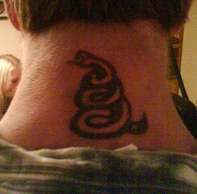 Snake symbol  tattoo on neck