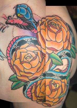 Blue snake with yellow flowers tattoo