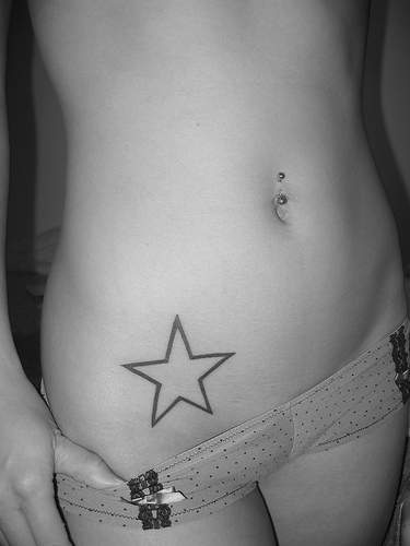 Black line star tattoo