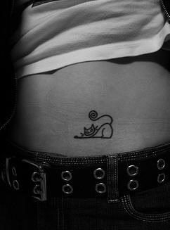 Stomach tattoo, black, pretty cat lying with curled tail