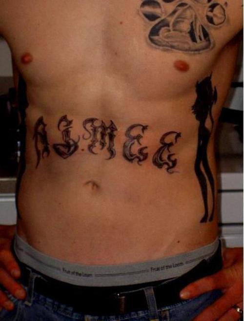 Stomach tattoo, two thin beautigul evil girls and inscription