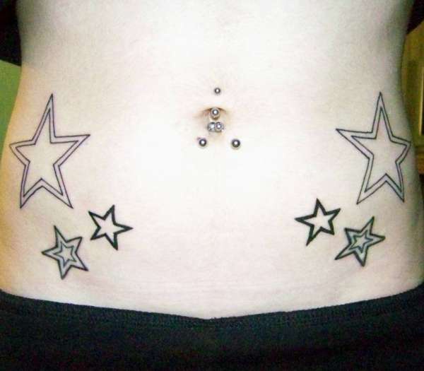 Stomach tattoo, six, unfilled stars, different sizes