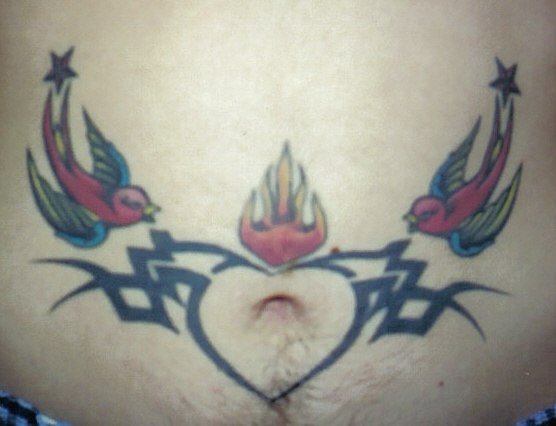 Stomach tattoo, fireing heart between two swallows