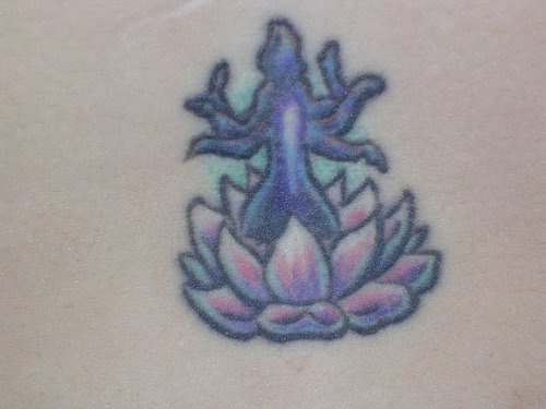 Stomach tattoo, yoga, different positions in lotus