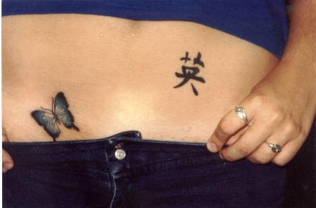 Stomach tattoo, little butterfly,black  hieroglyph