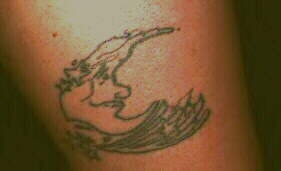 Black ink moon crescent tattoo
