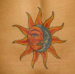 Colourful sun and moon tattoo