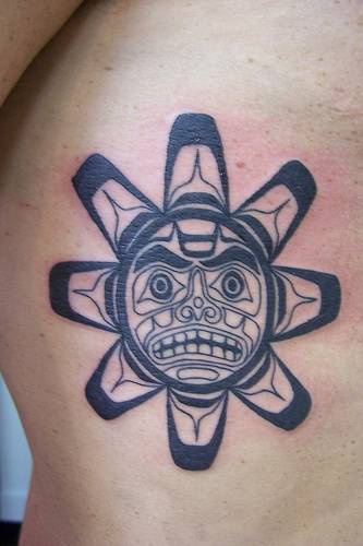 Símbolo del sol maya estilo tribal