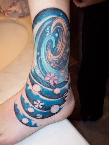 Amazing blue moon in vortex tattoo