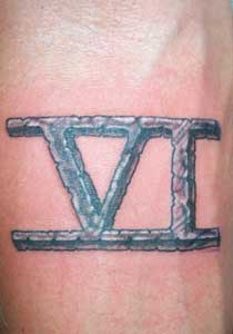 Roman numeral six tattoo